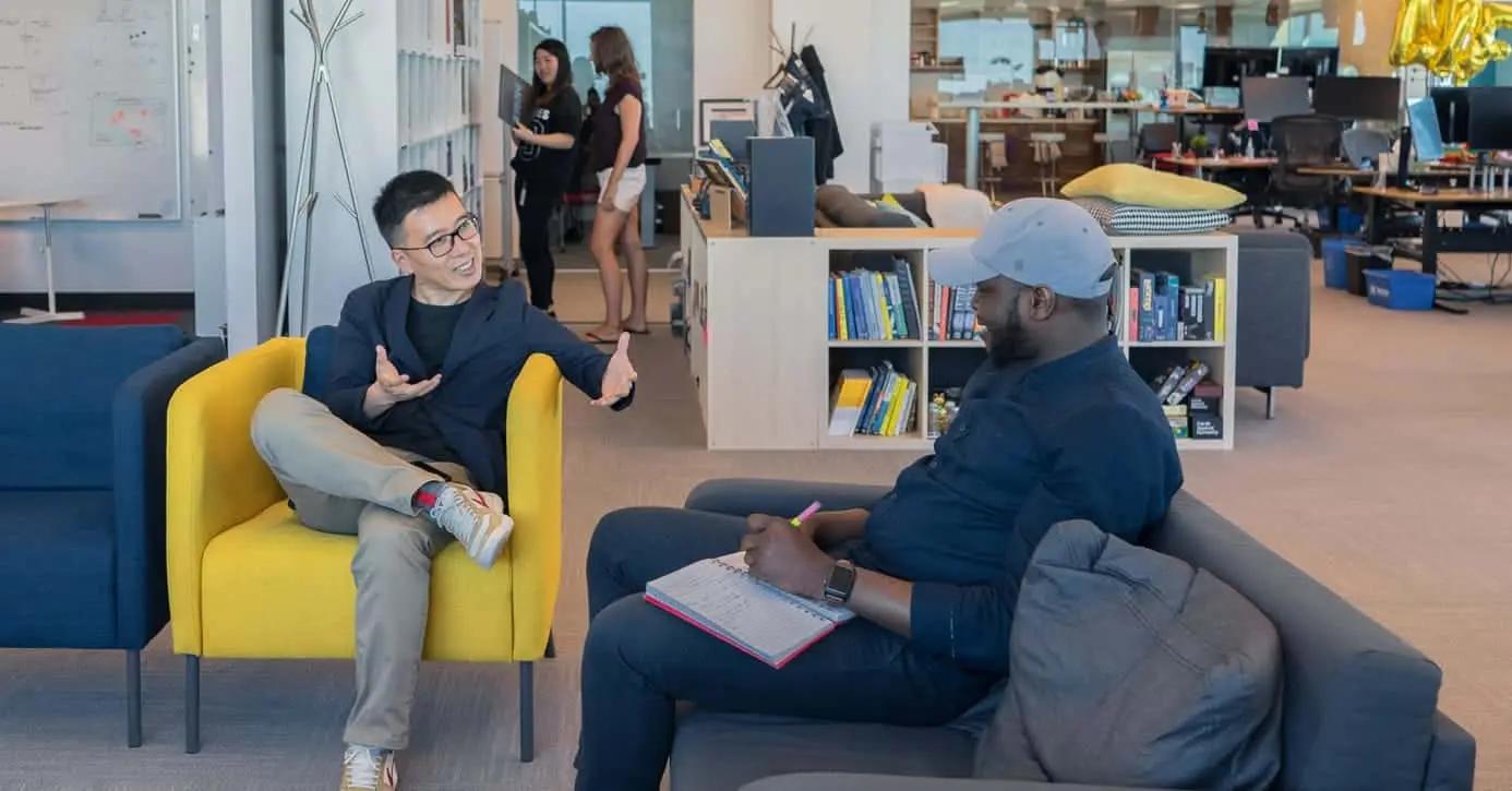 Two men engaged in conversation